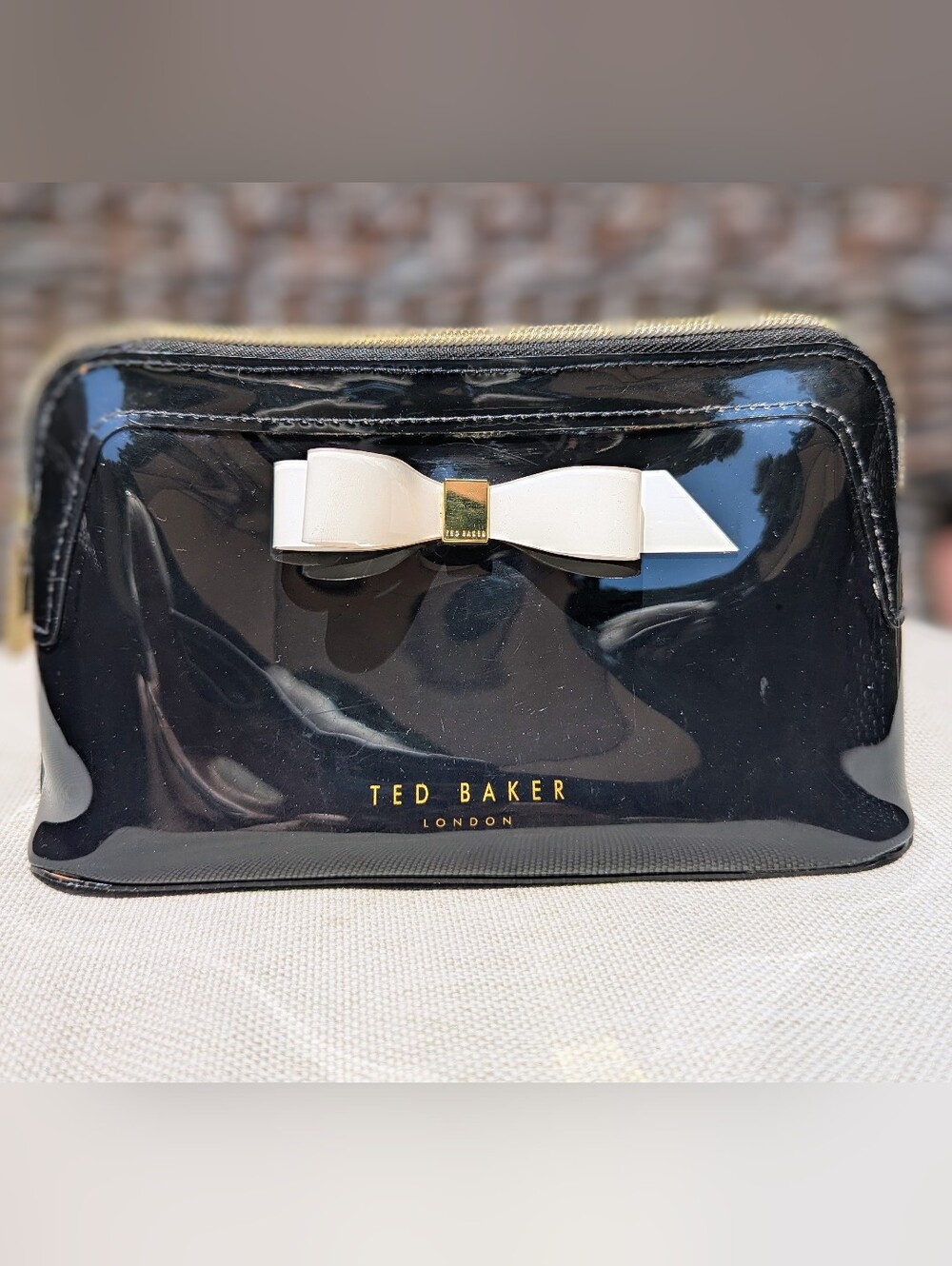 Ted Baker Black Patent Bow Cosmetic Bag with White Bow